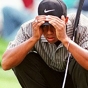 Tiger Woods looking at a putt